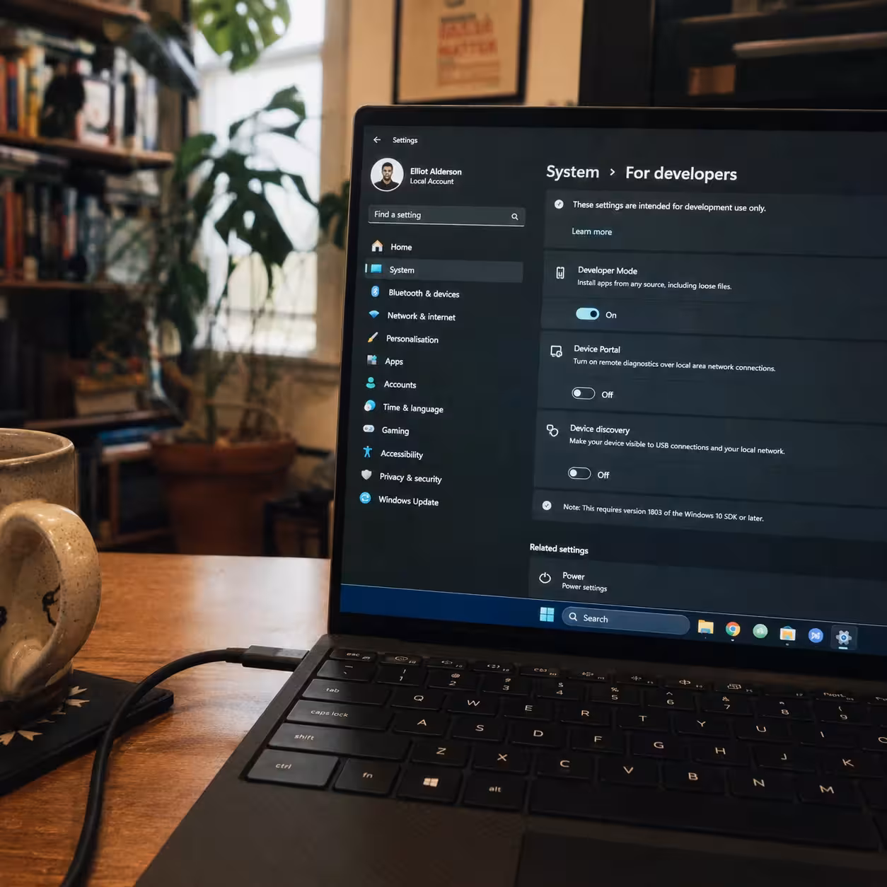 Windows 11 For Developers settings page open on a laptop showing Developer Mode toggle